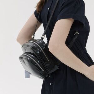 Nieeh Black Leather Backpack Bag
